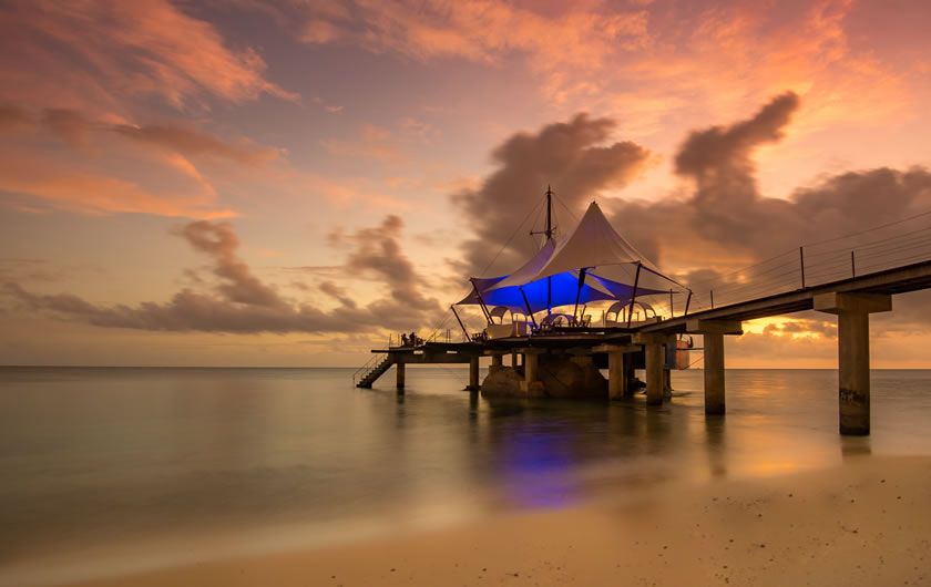 Coco de Mer & Black Parrot Suites jetty sunset